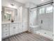 Elegant bathroom featuring a large walk-in shower, white cabinets, and quartz countertops at 2016 Cedar Falls Dr # 7, Waxhaw, NC 28173