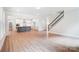 Spacious living area with hardwood floors and kitchen views at 2016 Cedar Falls Dr # 7, Waxhaw, NC 28173
