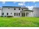 Two-story house with gray siding, covered porch, and landscaped yard at 2016 Cedar Falls Dr # 7, Waxhaw, NC 28173