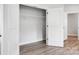 Walk-in closet with double doors and hanging rod at 2016 Cedar Falls Dr # 7, Waxhaw, NC 28173