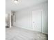 Spacious bedroom with carpet flooring and doors to hallway and bathroom at 2016 Cedar Falls Dr # 7, Waxhaw, NC 28173