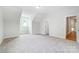 Spacious bedroom with carpet flooring, and access to hallway at 2016 Cedar Falls Dr # 7, Waxhaw, NC 28173