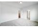 Spacious bedroom with neutral carpeting and en-suite bath access at 2016 Cedar Falls Dr # 7, Waxhaw, NC 28173