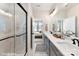 Bathroom with double vanity, shower, and view of bedroom at 512 Lockwood Creek Dr # 29, Charlotte, NC 28208