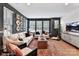 Living room with comfy sofas and large TV at 512 Lockwood Creek Dr # 29, Charlotte, NC 28208