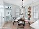 Bright dining area with glass table and four chairs at 512 Lockwood Creek Dr # 29, Charlotte, NC 28208