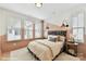Bedroom with neutral color palette and unique headboard at 512 Lockwood Creek Dr # 29, Charlotte, NC 28208