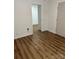 Unfinished basement area with access to another room at 115 Palmer St, Shelby, NC 28150