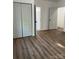 Large bedroom with double door closet and vinyl flooring at 115 Palmer St, Shelby, NC 28150