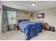 Bedroom featuring a flat-screen TV and ample closet space at 8714 Brideswell Ln, Charlotte, NC 28278