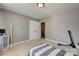 Bright bedroom with double doors and carpet flooring at 8714 Brideswell Ln, Charlotte, NC 28278