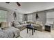 Spacious Gathering room featuring a sectional sofa and media setup at 8714 Brideswell Ln, Charlotte, NC 28278