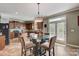 Kitchen with breakfast nook and access to backyard patio at 8714 Brideswell Ln, Charlotte, NC 28278