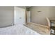 Bright bedroom with ample closet space and a desk area at 8714 Brideswell Ln, Charlotte, NC 28278