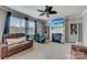 Gathering room with fireplace, built-in shelving, and comfortable seating at 8714 Brideswell Ln, Charlotte, NC 28278