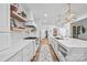 White kitchen with marble countertops and gold accents at 1611 Fieldbrook Rd, Rock Hill, SC 29732