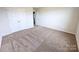 Spacious bedroom featuring carpet flooring and double-door closet at 414 Apex Cir, Shelby, NC 28152