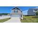 Two-story house with attached garage and well-maintained lawn at 414 Apex Cir, Shelby, NC 28152