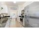 Modern kitchen with stainless steel appliances and granite countertops at 4198 Pickering Dr, Hickory, NC 28602