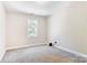Bright bedroom with carpet and a window at 4198 Pickering Dr, Hickory, NC 28602