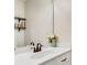 Simple bathroom with white vanity and bronze faucet fixtures at 4198 Pickering Dr, Hickory, NC 28602