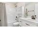 Small bathroom with tub shower, vanity, and linen closet at 4198 Pickering Dr, Hickory, NC 28602