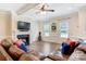 Bright living room with hardwood floors, fireplace, and two leather sofas at 4198 Pickering Dr, Hickory, NC 28602