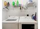 Laundry room with washer, dryer, and overhead shelving at 4198 Pickering Dr, Hickory, NC 28602