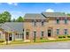 Brick townhouses with two units, featuring shutters and landscaping at 4198 Pickering Dr, Hickory, NC 28602