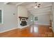 Spacious living room with hardwood floors and fireplace at 149 Pine Hollow Dr, Dallas, NC 28034