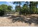 View of house from across the yard, showing a basketball goal at 149 Pine Hollow Dr, Dallas, NC 28034