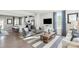 Open concept living room with hardwood floors and kitchen views at 1979 Tupelo Grove Ln, Gastonia, NC 28054