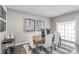 Bright dining area with a wooden table and access to a patio at 1979 Tupelo Grove Ln, Gastonia, NC 28054