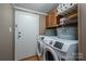 Laundry room with washer, dryer, and storage at 1219 Neely Smith Ln, Gastonia, NC 28056