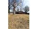 Brick ranch house with a yard and trees at 12560 Highway 601 Hwy, Midland, NC 28107