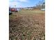 Vacant land with some scattered leaves at 12560 Highway 601 Hwy, Midland, NC 28107