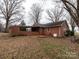 Brick house with covered patio and side yard at 12560 Highway 601 Hwy, Midland, NC 28107