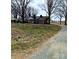 Brick ranch house with a gravel driveway at 12560 Highway 601 Hwy, Midland, NC 28107