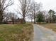 Brick ranch home with a long driveway at 12560 Highway 601 Hwy, Midland, NC 28107