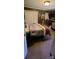 Bedroom with carpet, double bed, and a wall-mounted TV at 2210 Goldmine Rd, Monroe, NC 28110