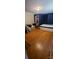 Spacious bedroom with hardwood floors and a large closet at 2210 Goldmine Rd, Monroe, NC 28110