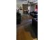 Living room with carpeted floors and a brick fireplace at 2210 Goldmine Rd, Monroe, NC 28110