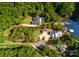 Aerial view of lakefront property with marked lot lines at 135 Holt Ln, Mooresville, NC 28117