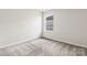 Bright bedroom with carpeted floor and window at 610 Cashion Rd, York, SC 29745