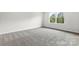 Simple bedroom with gray carpet and large window at 610 Cashion Rd, York, SC 29745