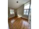 Bright bedroom featuring hardwood floors and large windows at 419 Bethel Dr, Salisbury, NC 28144