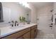 Bathroom with double vanity and tub at 5919 Wetlands Aly, Charlotte, NC 28215