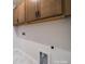 Laundry room with wooden cabinets at 5919 Wetlands Aly, Charlotte, NC 28215