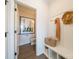 Convenient powder room with built-in storage bench at 5919 Wetlands Aly, Charlotte, NC 28215
