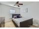 Bedroom with gray sleigh bed and window seating at 2412 Sonoma Valley Dr, Charlotte, NC 28214